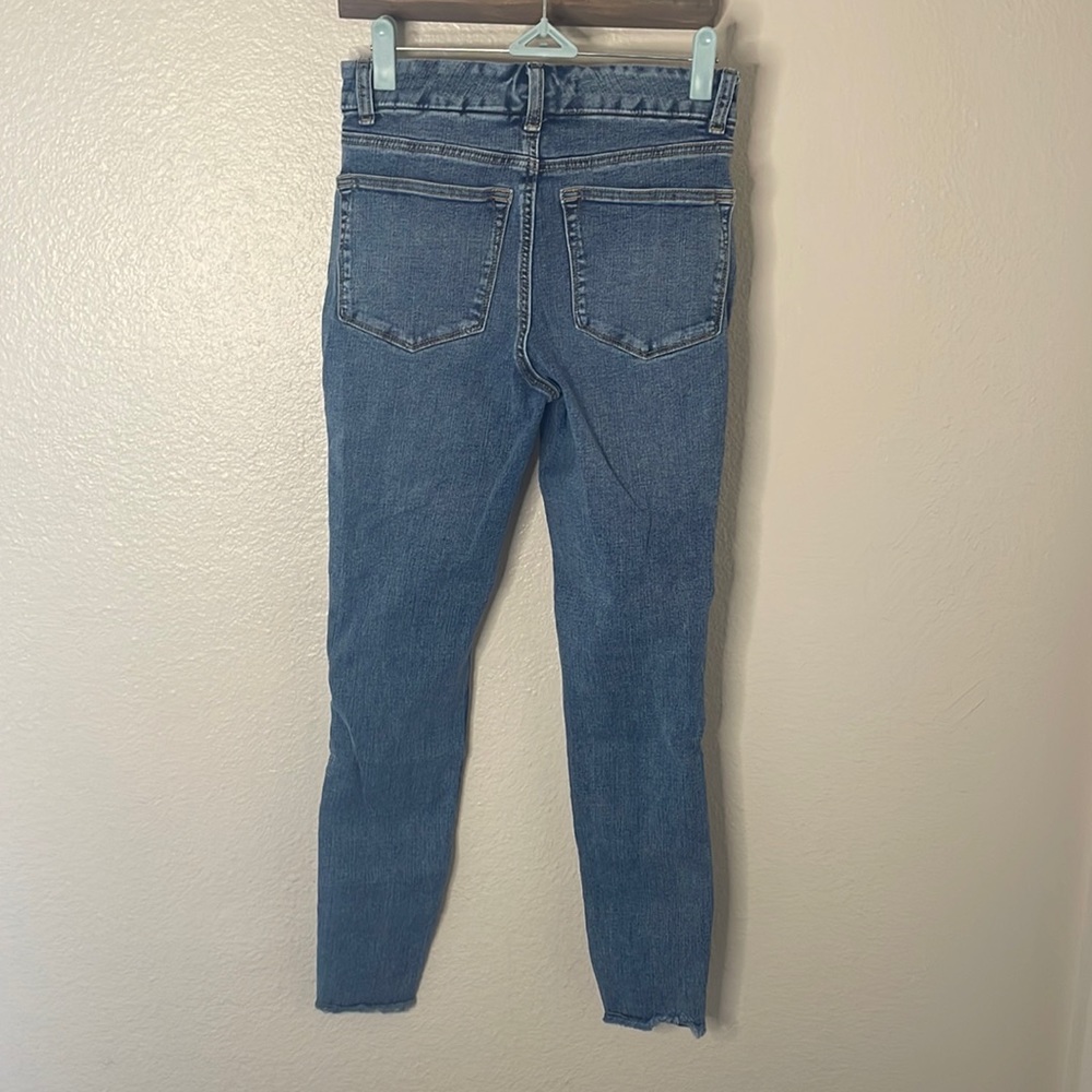 Button fly skinny jeans